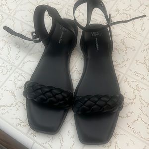 Size 9 new flat sandal. Never worn